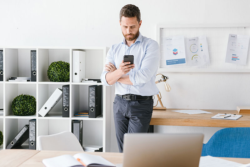 Man working from phone